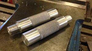 A threaded and groved aluminium bolt. Custom made for a client.