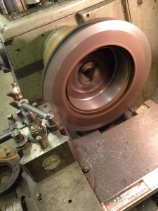 spinning a metal disc in the lathe